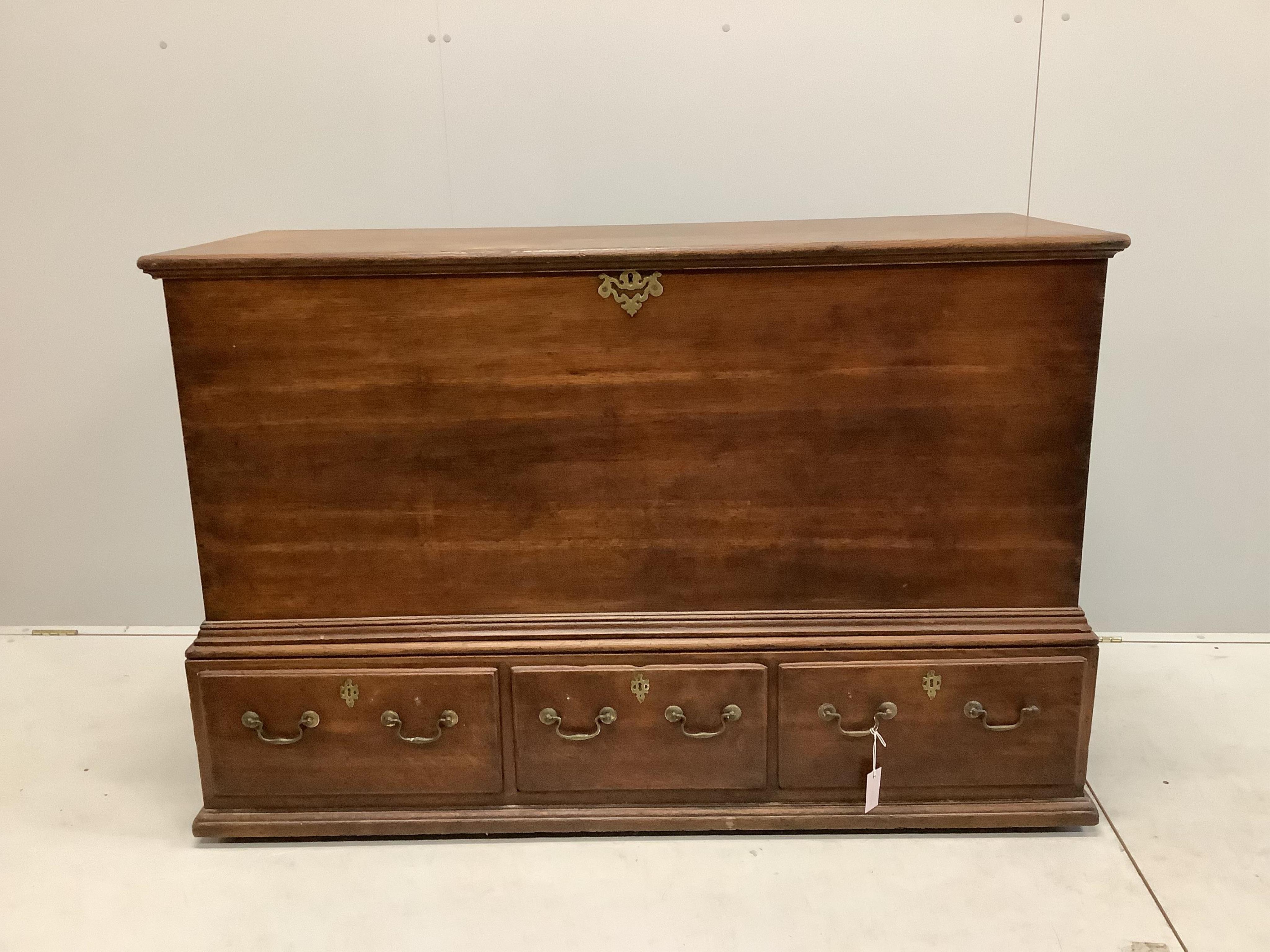 An 18th century oak mule chest, width 143cm, depth 55cm, height 98cm. Condition - fair